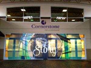 Cornerstone's new branding depicted by exterior letter and a beautiful window graphic.